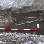 Figure 45. T188, showing 2872* (adult male) accompanied by a bronze fibula (O659) found near left foot.