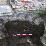 Figure 52. 3771*, a child in probable collective tomb plot (T312) next to church entrance.